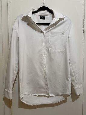 White Button-Down Shirt with Subtle Chest Tag